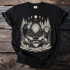 Black t-shirt with print of a hooded figure, raven, wolf, trees, and runes.