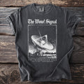 Dark t-shirt with "The Wow! Signal" and a radio telescope graphic.