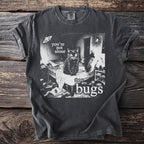 Black cat on a messy bed with text "you're not alone there are bugs".