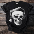 Black t-shirt with a white skull wearing a Santa hat graphic.