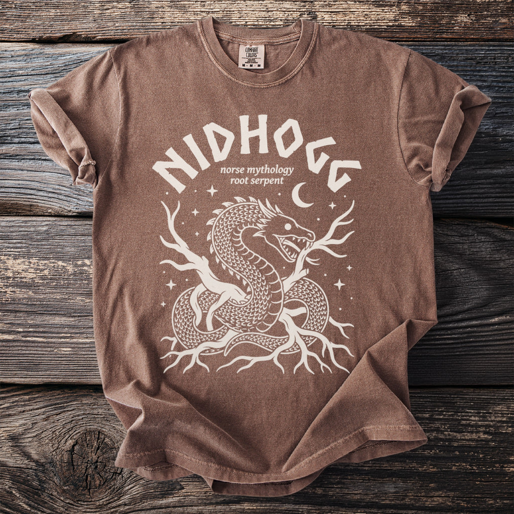 Brown t-shirt with white graphic of Nidhogg, Norse mythology root serpent, and moon.