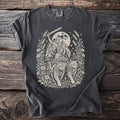 T-shirt with a vintage-style print of a woman with wings and a sword pulled by cats.