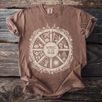 Brown t-shirt with a cream "Wheel of the Year" graphic featuring seasonal holidays and symbols.