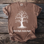 Brown t-shirt with white Christmas tree graphic adorned with skulls and lights.