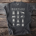 Dark gray t-shirt with "BEETLES AN ILLUSTRATED STUDY OF THE INSECT WORLD" and various beetle illustrations.