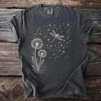 Dark grey t-shirt with white dragonfly and dandelion seed graphic.
