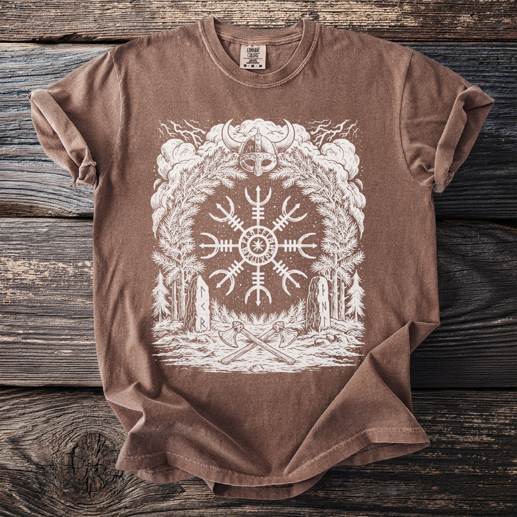 Brown t-shirt with white Viking helm, Norse symbol, trees, axes, and stones graphic.