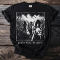 Black t-shirt with artwork of figures in a cornfield holding a pumpkin, and text "girls will be girls."