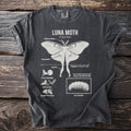Dark t-shirt with a detailed white illustration and labels of a Luna Moth and its life cycle.