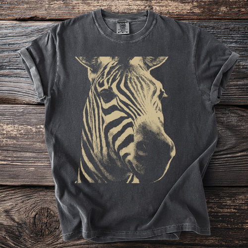 Dark gray t-shirt with a beige zebra face graphic and Comfort Colors tag.