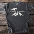 Dark grey t-shirt with white graphic of a crow and text "witness to murder".