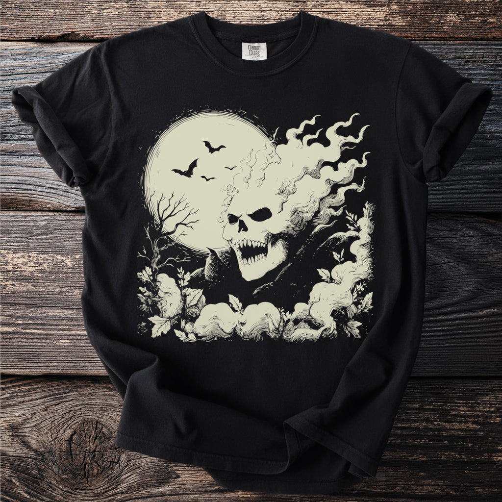 Black t-shirt with a cream graphic of a smoking skull, bats, and a tree against a moon.