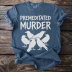 Blue t-shirt with white text "Premeditated Murder" and a group of crows.