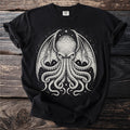 Black t-shirt with a white winged monster covered in tentacles.