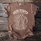 Brown t-shirt with Grim Reaper, scythe, tombstones, and moon graphic.