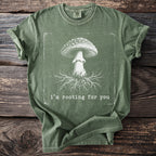 Green t-shirt with illustration of mushroom and roots, and text "i'm rooting for you".