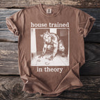 Brown t-shirt with a werewolf image and text "house trained in theory".