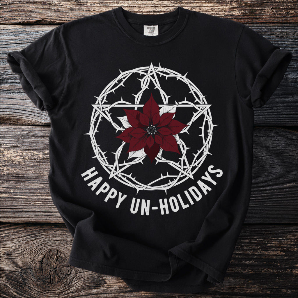 Black t-shirt with barbed wire pentagram and poinsettia, reading "Happy Un-Holidays".