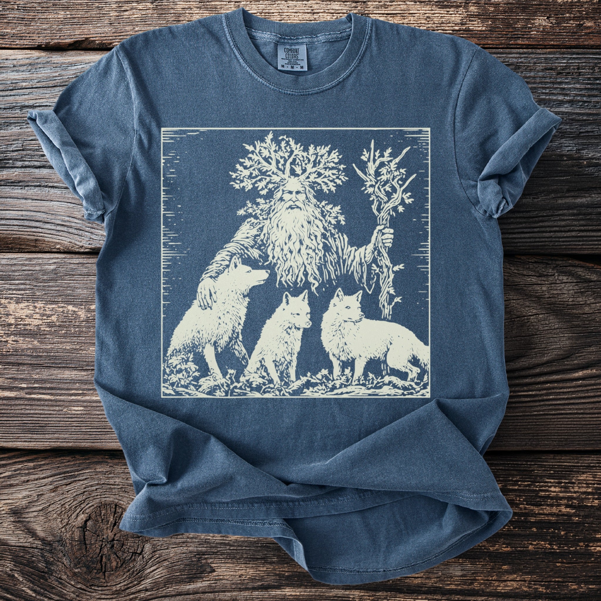 Woodland spirit with flowing beard and tree branches, flanked by three foxes.