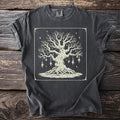 Dark gray t-shirt with a large, intricate cream-colored tree illustration and mystical decorations.