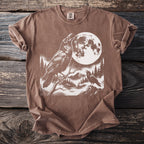 Brown t-shirt with two ravens and a large full moon in a wooded mountain landscape.