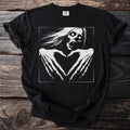Black t-shirt with monochrome horror graphic of screaming face making heart shape