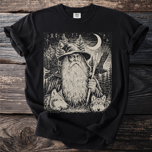Black t-shirt with print of wizard, wolves, ravens, trees, and moon.