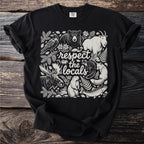Black t-shirt with "respect the locals" text surrounded by woodland animals and plants.