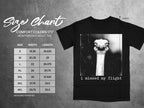 Black t-shirt with ostrich graphic and "i missed my flight" text, includes size chart.
