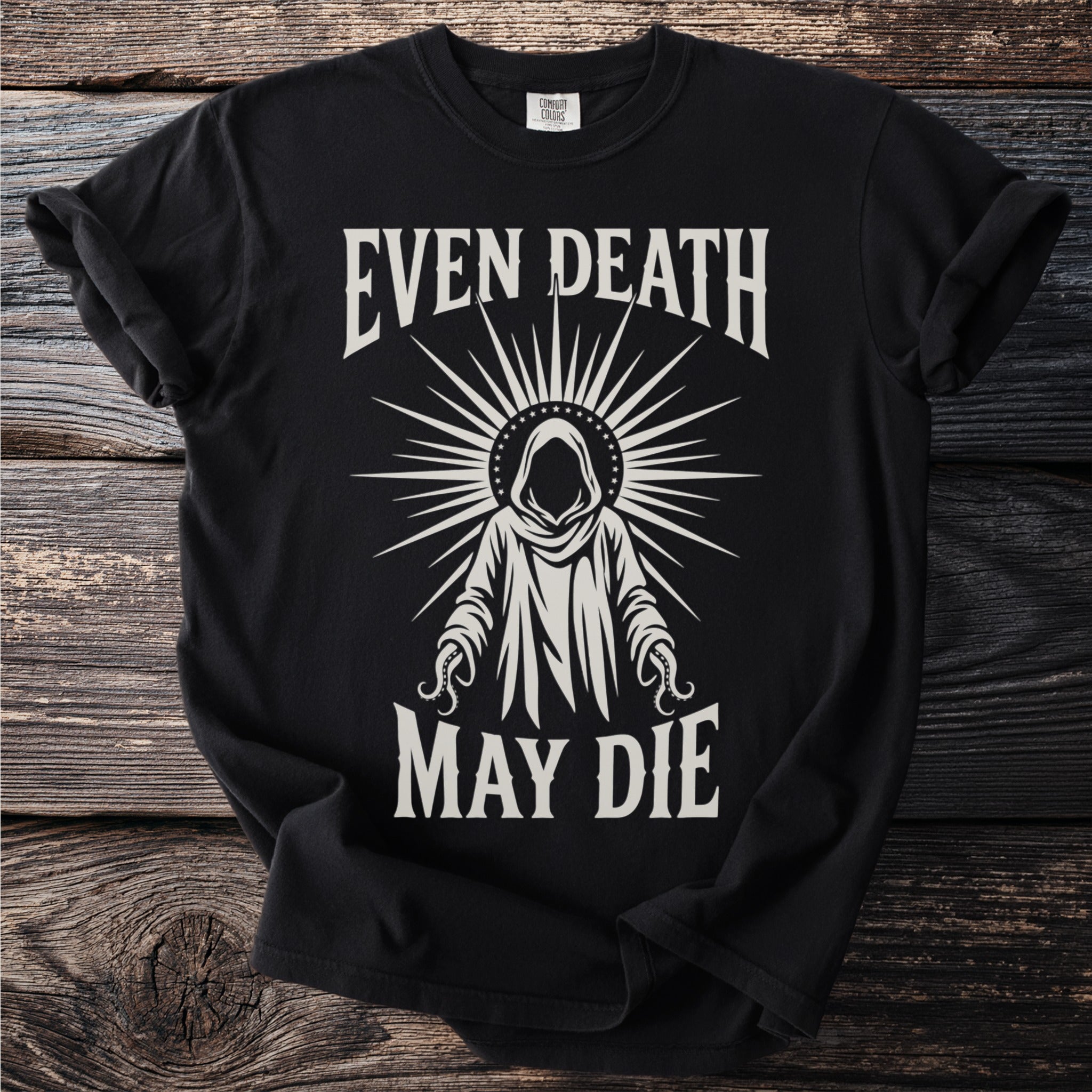 Black t-shirt with text "EVEN DEATH MAY DIE" and a hooded figure.