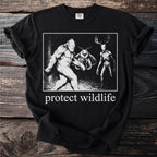 Black t-shirt with "protect wildlife" text and a graphic of Bigfoot, mothman, and a deer-headed skeleton.