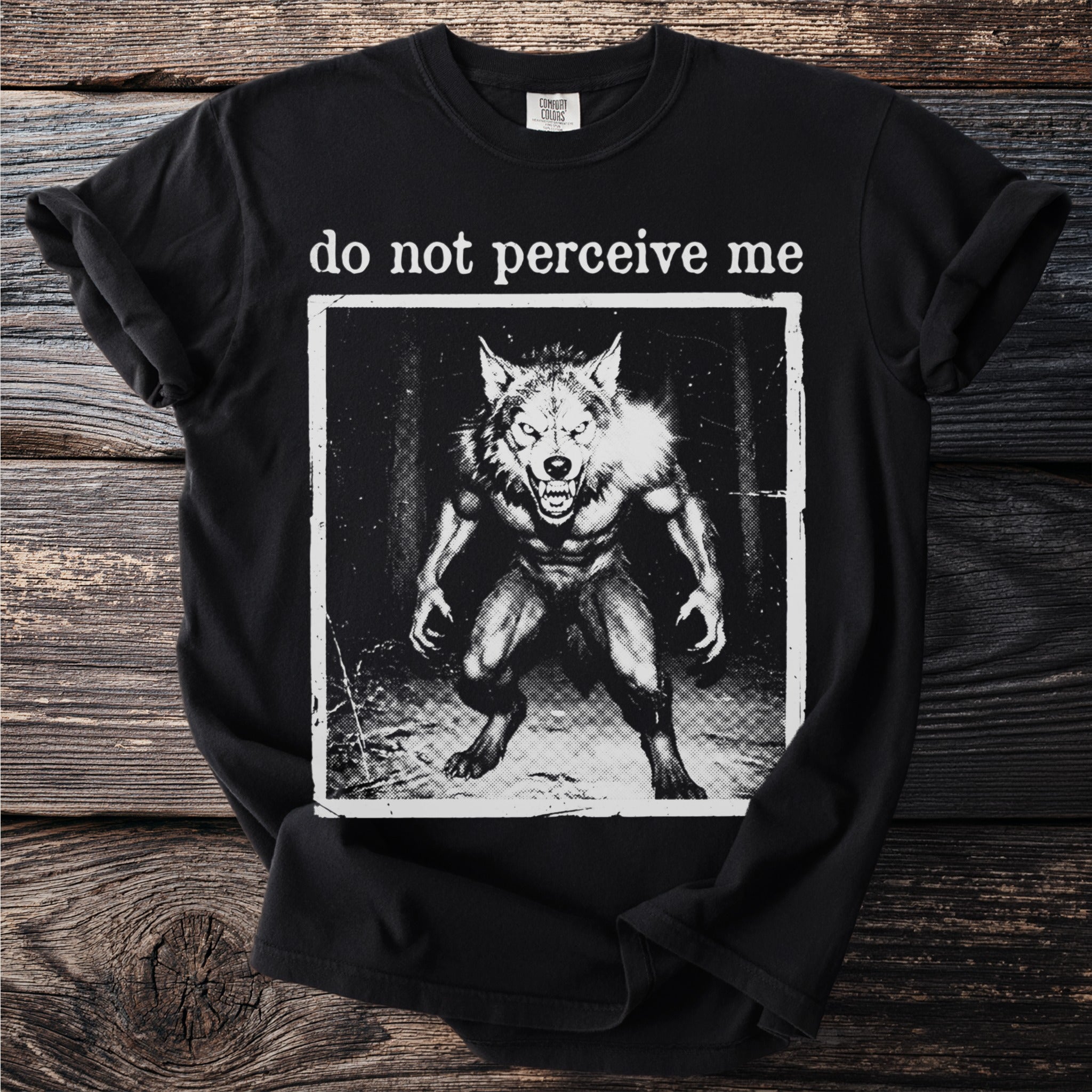 Black t-shirt with a graphic of a snarling werewolf and the text "do not perceive me".
