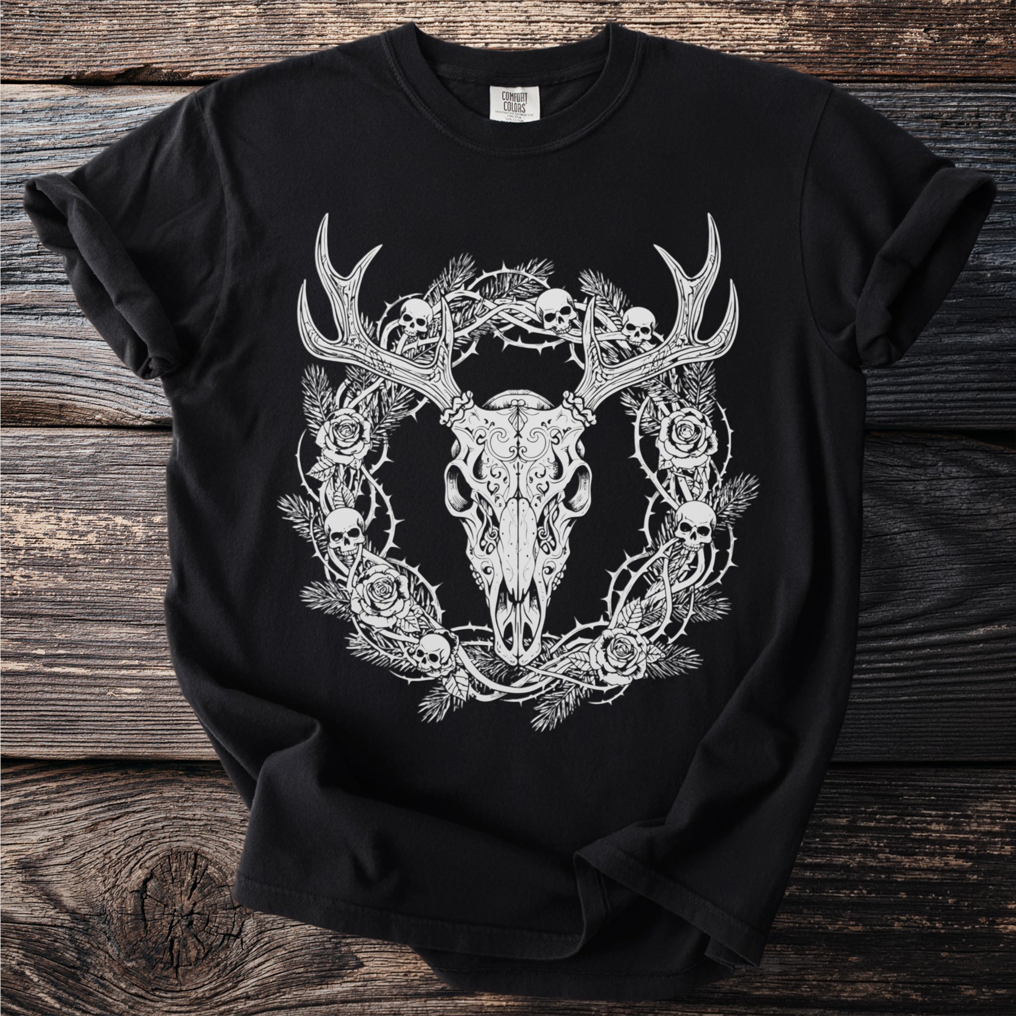 Black t-shirt with an ornate deer skull surrounded by roses and skulls.