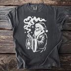Dark gray t-shirt with a white graphic of a skeleton in a Santa hat holding a lantern.
