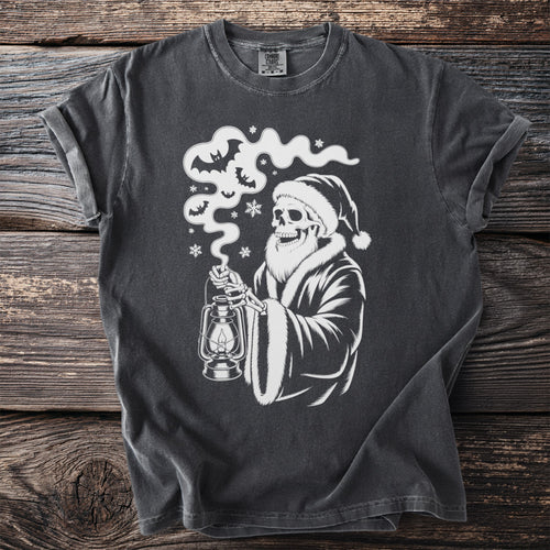 Dark gray t-shirt with a white graphic of a skeleton in a Santa hat holding a lantern.