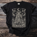 Black t-shirt with a stylized illustration of a woman with antlers, ravens, and skulls.