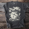Dark t-shirt with an illustration of an owl on a branch with a lantern and moon.