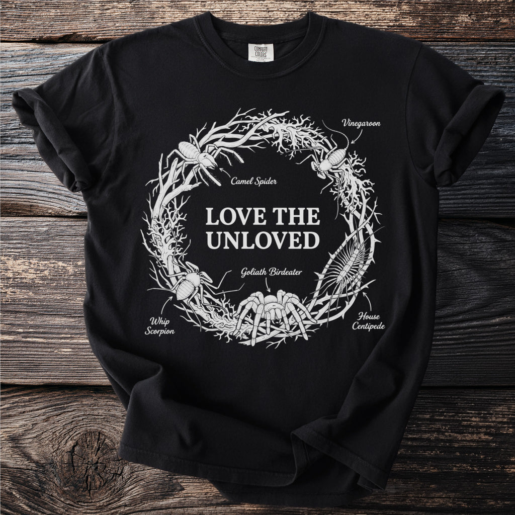 Black t-shirt with white "Love the Unloved" text and insect illustrations in a circle.