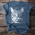 Blue t-shirt with a distressed print of a cat holding a cigarette.
