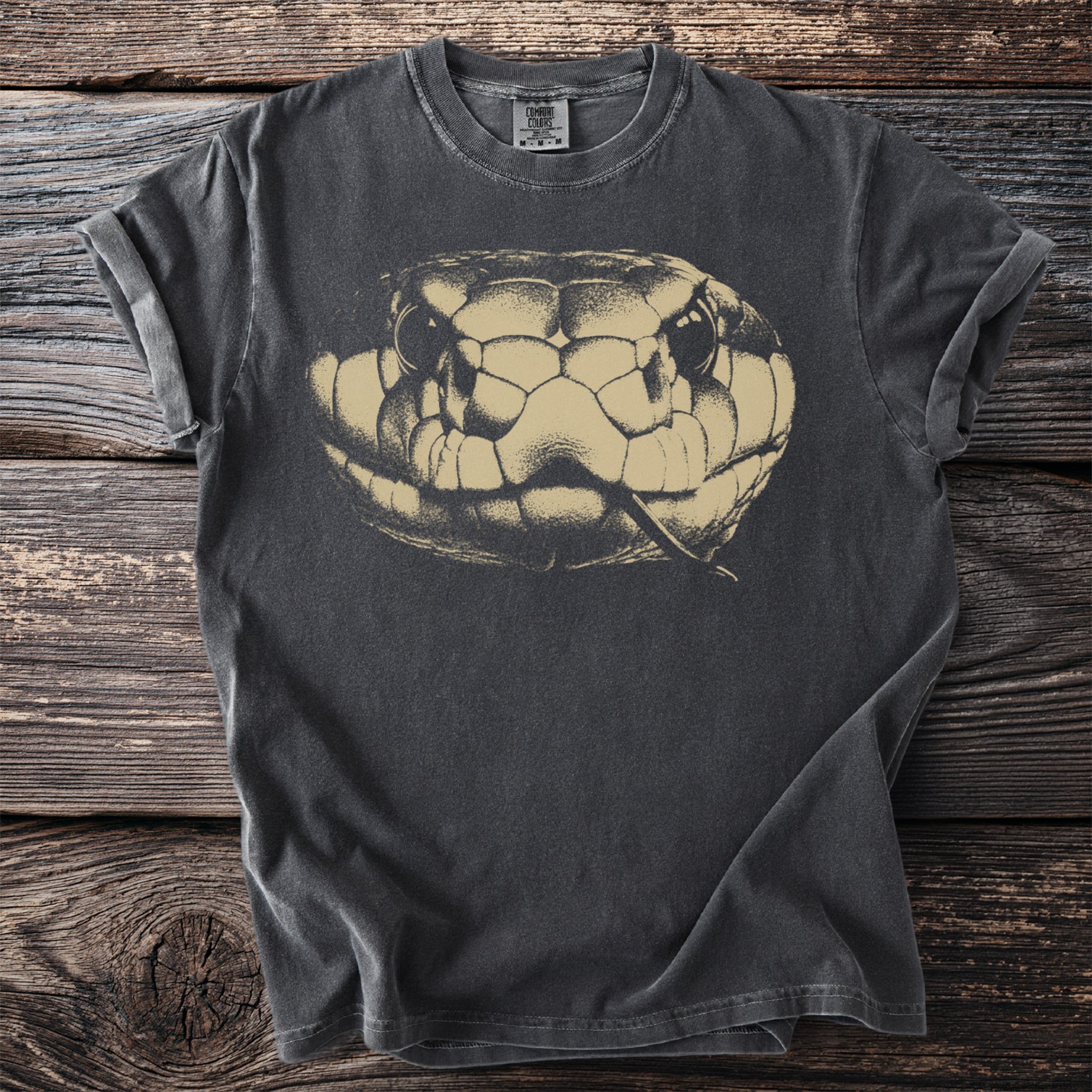 Vintage black t-shirt with a coiled snake head graphic and Comfort Colors tag.