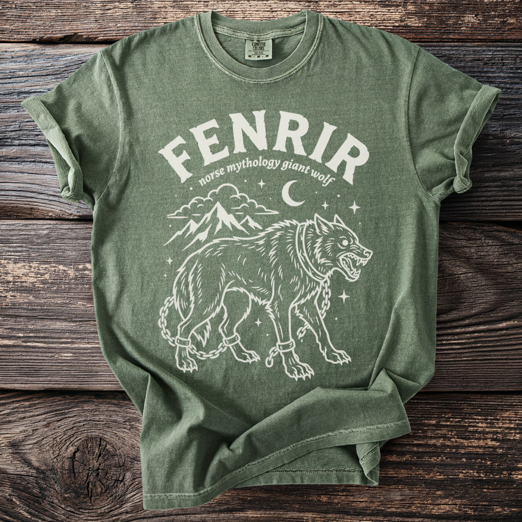 Green t-shirt with Fenrir, norse mythology giant wolf, design and mountains.