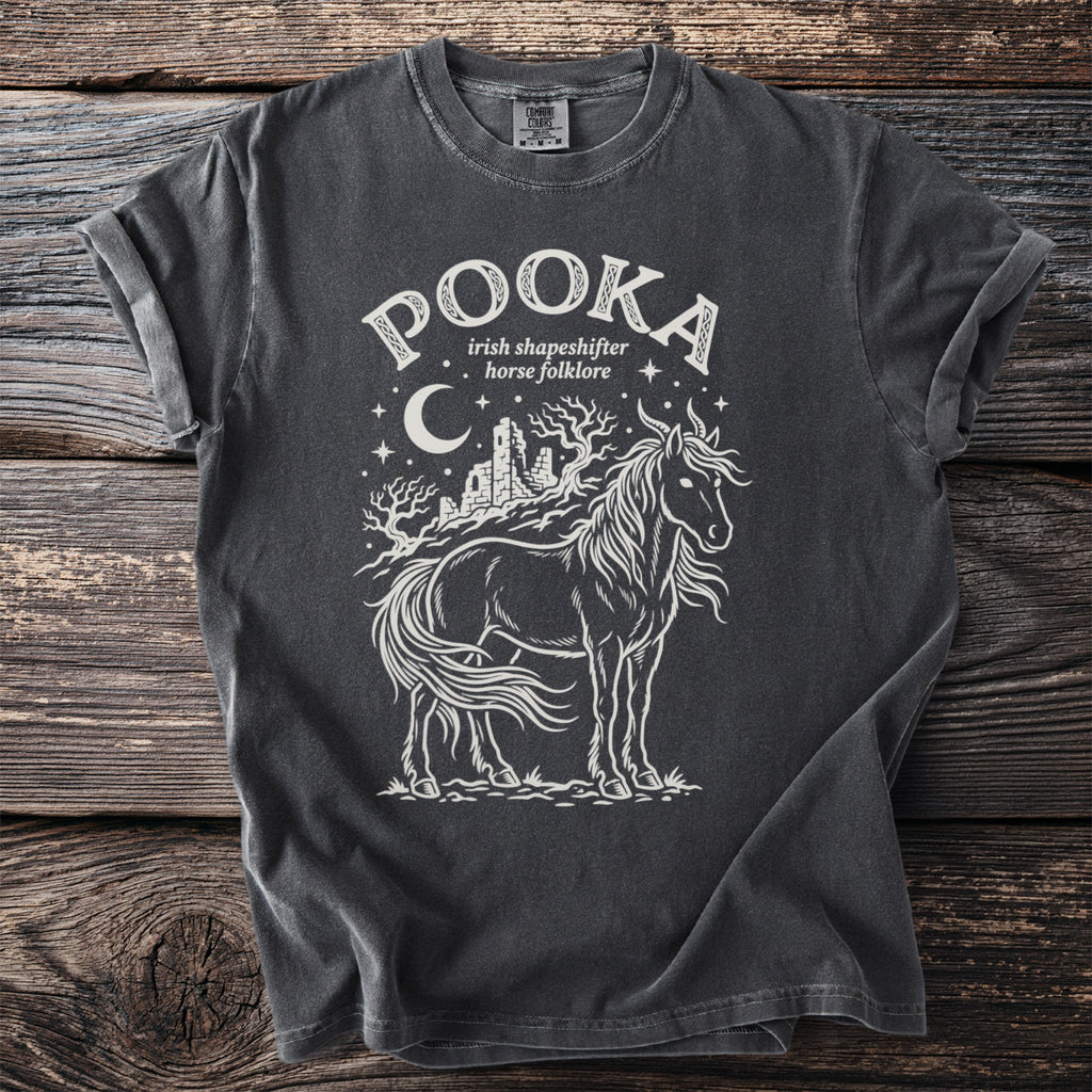 Charcoal t-shirt with white "POOKA irish shapeshifter horse folklore" graphic and horse illustration.