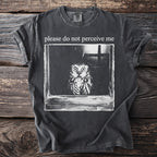 Dark gray t-shirt with text "please do not perceive me" and an owl graphic.