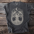 Dark t-shirt with a knotwork tree, two ravens, a moon, and runes.