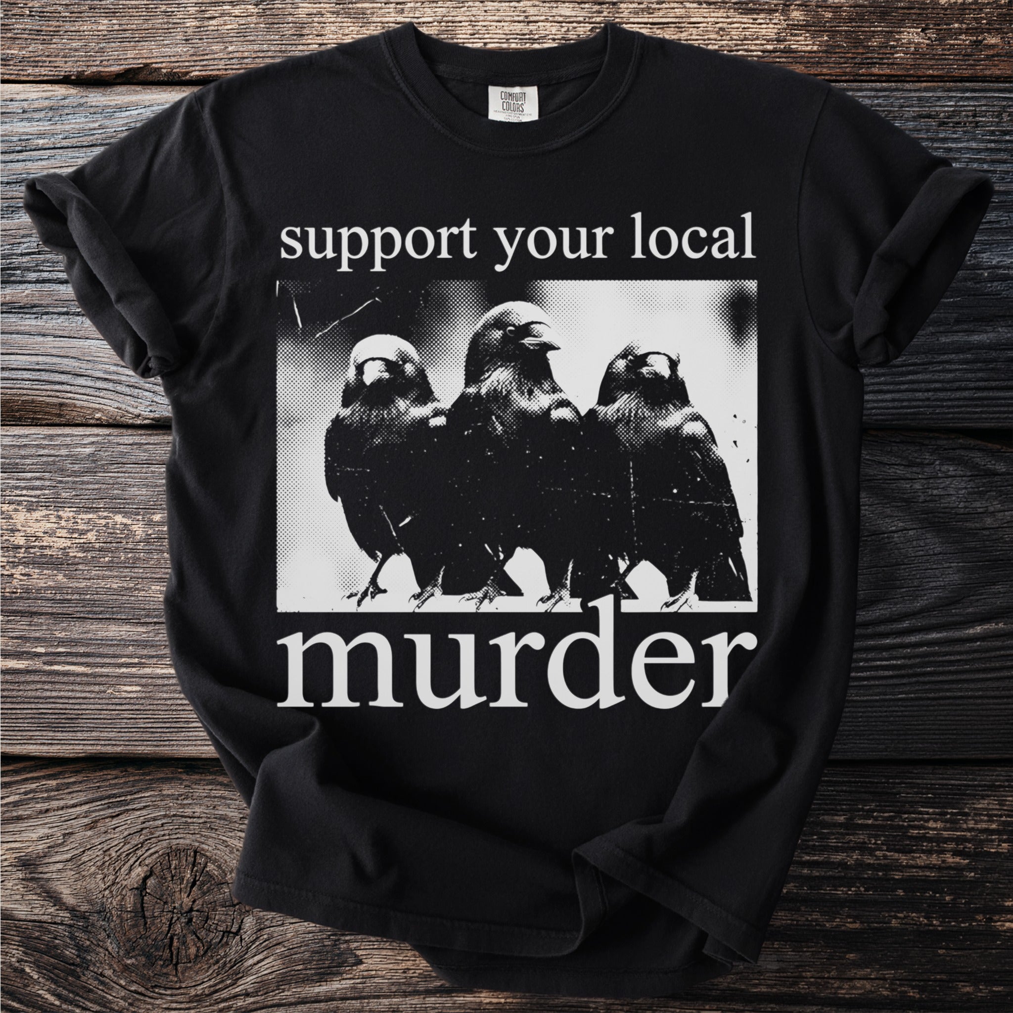 Black t-shirt with white text and image of three crows.