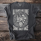 Dark t-shirt with white text "All Plants Are Edible Some Only Once" and skull and plant graphic.