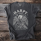 Charcoal t-shirt with white graphic of a harpy, moon, stars, and mountains.
