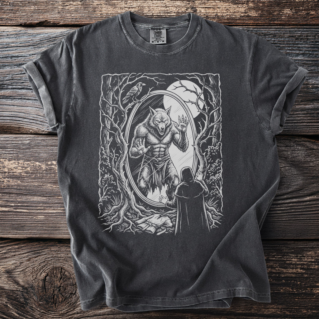 T-shirt with a dark wash and a werewolf transformation graphic in a forest scene.