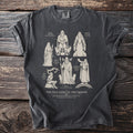 Dark grey t-shirt with illustrations of Norse gods: Thor, Freyja, Frigg, Heimdall, Loki, and Odin.