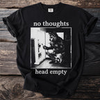 Black t-shirt with wolf at open refrigerator and text "no thoughts head empty."